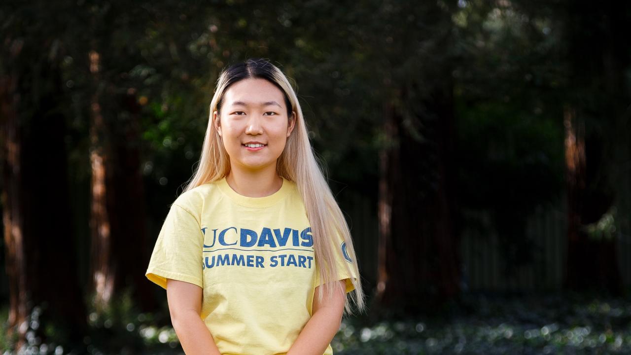 Rosemary Xu, a participant in Summer Start at UC Davis, standing in the redwood grove.