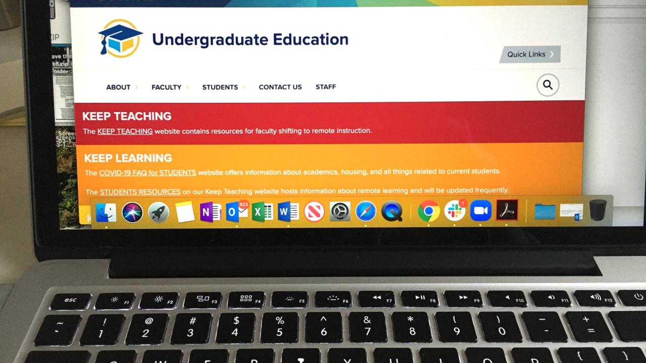 laptop with UE webpage on the monitor