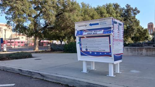 Ballot drop-box located between the Memorial Union terminal and Tennis Court Lane. 